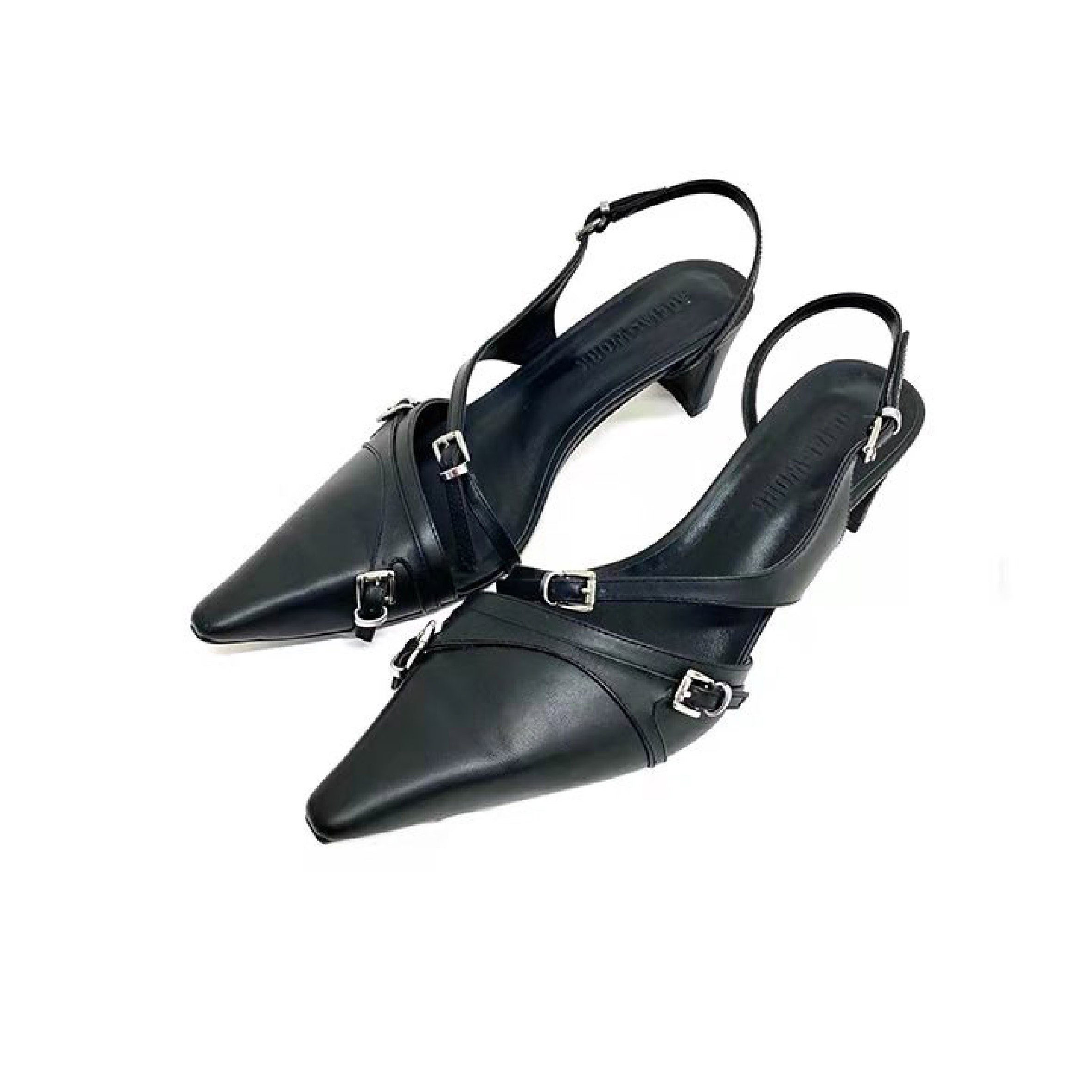 Irregular Heeled Mules